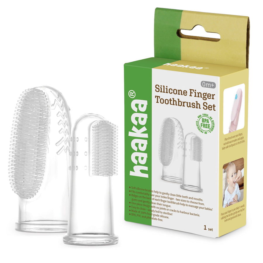 Haakaa silicone finger toothbrush set with small and large brushes shown beside branded retail box