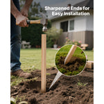 Person using a hammer to drive a wooden stake into soil with circular close-up of the stake’s sharpened tip