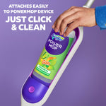 Hand attaching a Swiffer Power Mop Gain-scent refill into the mop handle against a purple background