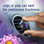 Hand placing a Febreze Car vent clip into a circular car vent with headline 'clips in your car vent for continuous freshness'