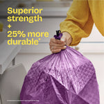 Hand gripping tied purple Glad ForceFlex bag with text highlighting superior strength and 25% more durable claim.