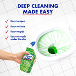 Hand holding a Lysol bamboo-scent toilet bowl gel bottle with a toilet bowl showing green cleaning gel patterns