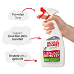 Hand holding Nature's Miracle spray bottle with callouts: convenient spray, breaks down stains on contact, light scent