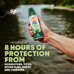 Hand holding an OFF! Deep Woods Dry aerosol can over a lake with large text advertising 8 hours of protection