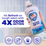 Hand holding a bottle of Suavitel Refresher Ocean Fresh with text callout 'Hit Refresh on tough odors with 4X Odor Action'