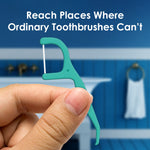 Close-up of a teal floss pick held between fingers with bathroom background and text about reach
