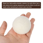 Hand holding a white felted wool dryer ball with an overlaid brown text panel about polyester ribbon.