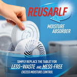 Hand inserting a round tablet into the DampRid reusable moisture absorber with messaging about less waste