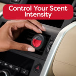 Hand placing a round red-scented mini diffuser into a car vent with text about controlling scent intensity