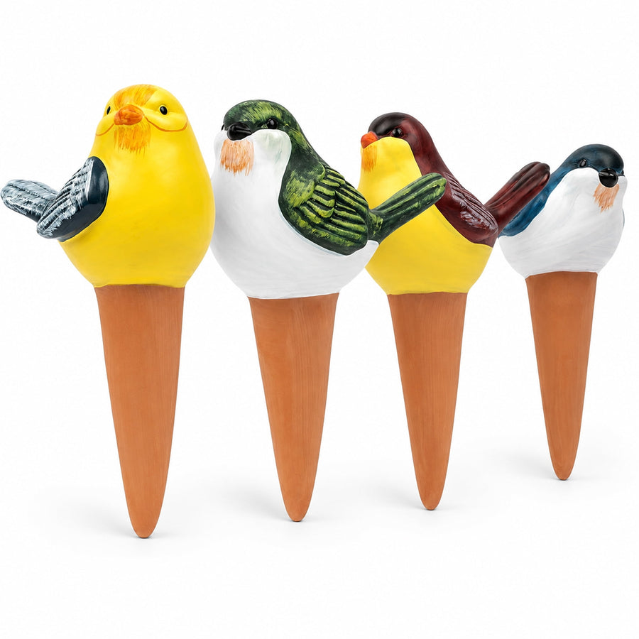Four hand-painted bird-shaped terracotta watering spikes with colorful glazed ceramic bird tops on terracotta stakes