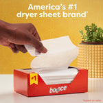 Hand pulling a dryer sheet from an open red Bounce dispensing box with text 'America's #1 dryer sheet brand'
