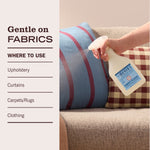 Hand spraying Mrs. Meyer’s Fabric Freshener onto couch cushions with a panel listing fabric uses.