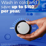 Close-up infographic of a hand turning a washing machine temperature dial with overlay text about washing in cold to save money.