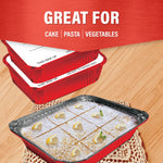 Styled shot of a baked dessert in a red Handi-Foil 13x9 pan with stacked red pans and board lids in background