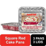 Two foil square cake pans with red printed exterior and a labeled Handi-foil product sticker showing cake image