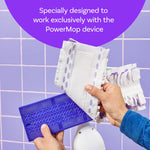 Hands fitting a Swiffer Power Mop pad onto the purple mop head with tiled purple wall background and product callout above.
