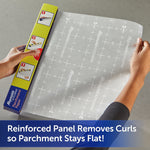 Hands pulling Reynolds Kitchens parchment paper from the box showing printed SmartGrid cross pattern and reinforced panel