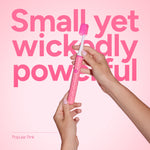 Hands holding a pink Ordo Sonic Edge toothbrush against bold pink text background