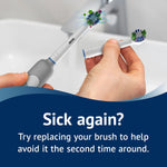 Hands removing a brush head from an electric toothbrush over a sink, with stylized bristle graphic indicating cleanliness.