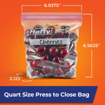 Hefty quart bag filled with cherries with measurements called out for width, height and expandable bottom