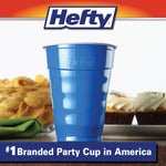 Blue Hefty party cup on a table with snacks in background and Hefty logo banner above