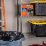 Hefty Ultra Strong trash bag box staged on a metal shelf next to storage bins and a lined trash can in a garage scene