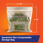 Hefty compostable sandwich bag displayed against orange background with printed width and height dimensions