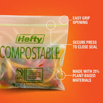 Close-up of a Hefty compostable bag with labeled callouts for easy grip, secure seal and plant-based materials