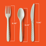 Three Hefty ECOSAVE patterned utensils laid flat with measured length callouts on an orange background