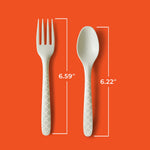 Single patterned Hefty ECOSAVE fork and spoon on an orange background with white measurement callouts
