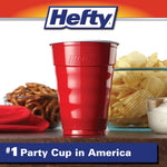 Red Hefty party cup in foreground with snack bowls behind and Hefty logo at top