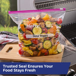 Hefty slider bag labeled 'Diced Veggies' sitting on a cutting board next to a grill, filled with vegetables