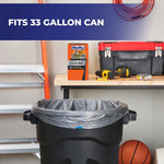 Hefty STEELsak boxed product placed on a workbench above a 33-gallon trash can with bag fitted inside