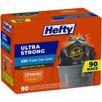 Angled view of Hefty Ultra Strong 33G trash bag box showing front and top panels, tied black bag image and '90 bags' badge.