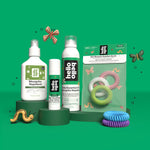 Styled product group image showing Hello Bello mosquito repellent products including a packaged set of kids bands and sprays on green stage