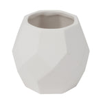 White geometric ceramic planter with faceted polygon shape and round opening, studio shot