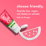 Hello fresh watermelon toothpaste tube squeezing white paste into a semicircle on a pink background with product attributes listed above.