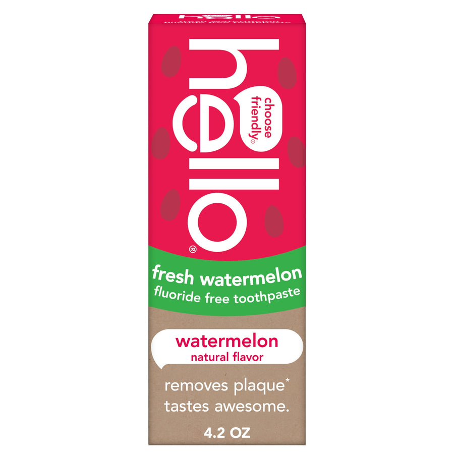 Hello fresh watermelon fluoride-free kids toothpaste box with bright pink, green and kraft color blocking and product callouts.