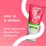 Tilted Hello fresh watermelon toothpaste tube on a pink background with bold white swirl and text promoting watermelon fluoride-free toothpaste.