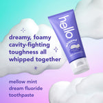 Purple Hello whipped toothpaste tube amid cloud-like foam with text promoting dreamy, foamy cavity-fighting formula