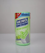 Cylindrical HERO Scent Stripes Fresh Citrus trash bag roll photographed on white surface