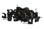 Scattered pile of multiple black plastic J-hook pipe clamps, each paired with a gold-tone nail, on a white background