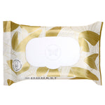 Top view of The Honest Company flushable wipes pack with white oval flip-top and gold leaf decorative pattern