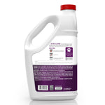 Rear view of a white Hoover cleaner solution jug with text instructions, barcode and purple product panel