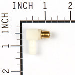 Top-down view of a white plastic and brass right-angle hose connector placed on inch measurement grid for scale