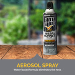 Hot Shot Wasp & Hornet aerosol can placed on a wooden surface with blurred outdoor background