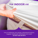 Close-up graphic of a hand lifting a mattress corner with text “For Indoor Use” and usage warnings on purple band.