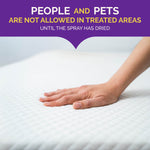 Hand touching a mattress surface beneath text warning people and pets are not allowed in treated areas until dry