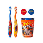 Flat lay of Brush Buddies Hot Wheels set with two colorful child toothbrushes, two round caps and an orange Hot Wheels rinsing cup