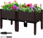 Studio product shot of a brown woven-look raised garden bed on legs filled with mixed flowering plants, white background.